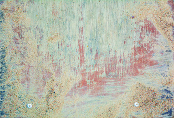 A worn old wood desk texture in the sand and mud as a background