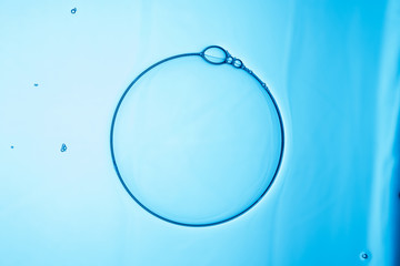 Soap bubbles on a light blue background