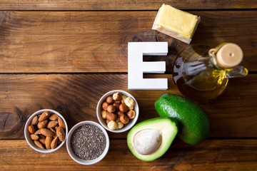 Natural products rich in vitamin E and letter E. helthcare concept