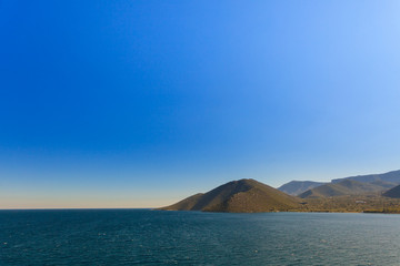 Greek seaside with cliffs