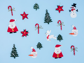 Christmas decorating with copy space on blue colour, top view.