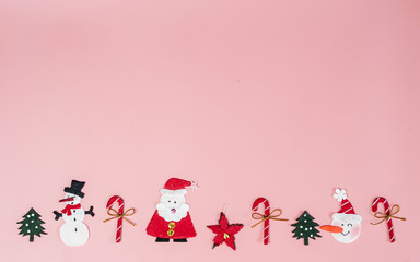 Christmas objects laid out in background.