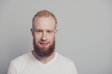 Obraz premium Portrait of good-looking gentleman stand isolated on light gray 