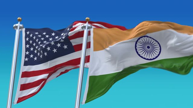 4k Seamless United States of America And India Flags with blue sky background,A fully digital rendering,The flag 3D animation loops at 20 seconds,USA IND IN.