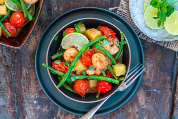 Thai prawns with pineapple and green beans - top view