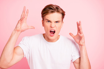 Trendy brunet hair man isolated on bright pink background wall r
