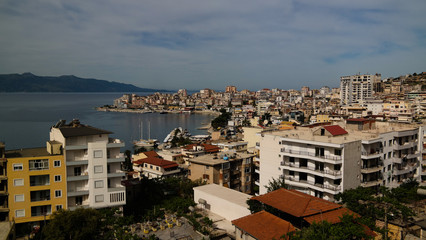 sunset Aerial Panoramic view to Saranda city and bay of Ionian sea, Albania