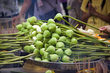 group of flower in buddhist temple and incense offered by the people