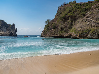 Fototapeta premium Clear waves of blue ocean, Atuh Beach, Nusa Penida, Indonesia. Landscape of paradise. October 2018