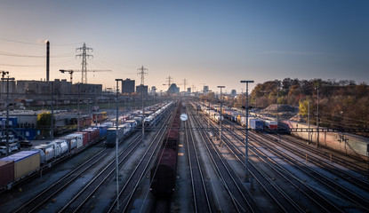 Fototapeta na wymiar Industrial railroad, multiple tracks and trains