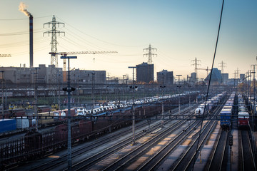 Obraz na płótnie Canvas Busy multiple track railway and industrial city