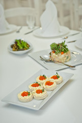 delicious dishes on the table in the restaurant. serving table.