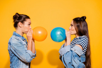 Photo portrait of two brunette hair lady look to each other blow
