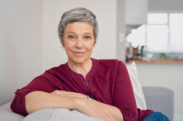 Smiling woman relaxing at home