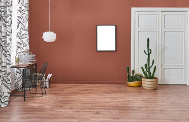 Brown living room, white lamp and frame picture style. Brown parquet and carpet style.