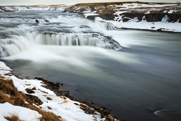 Fototapeta premium Ægissíðufoss waterfalls located near Hella at route 1, Iceland during Winter season.