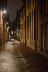 narrow street in amsterdam in the evening