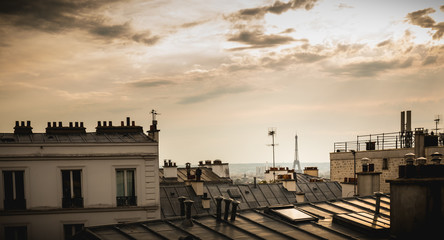Fototapeta premium View of the Eiffel Tower above the rooftops of Paris