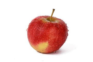 Fresh red natural apple with water drops isolated on white - Fresh raw organic fruit. 