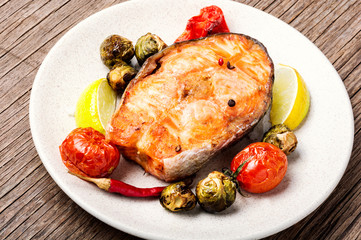 Baked salmon on plate