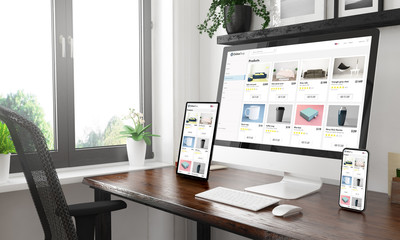 black and white desktop with three devices showing online shop