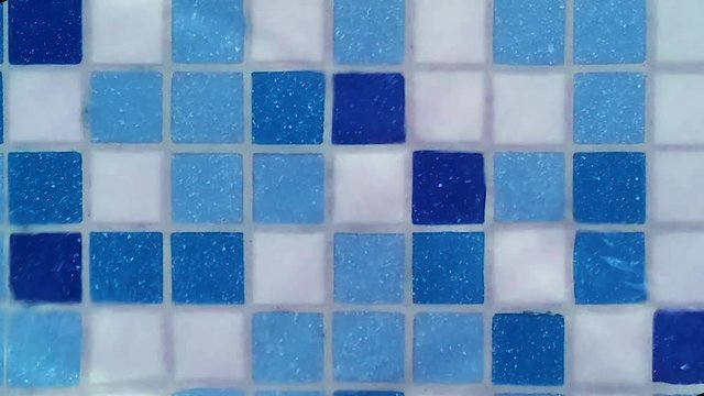Pool water background with blue tile