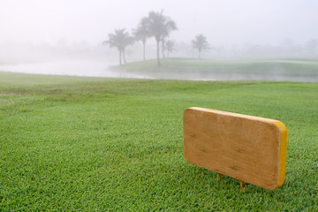 Golf sign in green golf course.