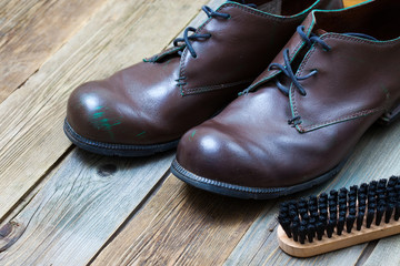 vintage boots, brush and shoe polish