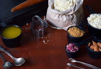 Making chickpea cookies pastries with almonds and tea rose petals. Traditional Eastern sweets....