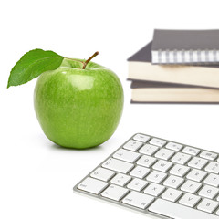Whole green apple with leaf on white background