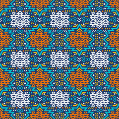Aztec style seamless geometry pattern with tribal ornament. Ornamental ethnic background collection. Use for fabric prints, surface textures, cloth design, wrapping. EPS 10 vector illustration.