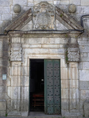 Door of Sancti Spiritus Church of the Third Franciscan Order - Melide, Galicia, Spain