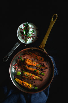 Healthy roasted carrots On dark background