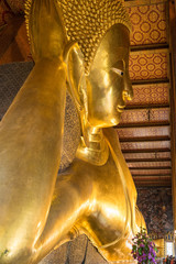 Wat Pho is a Buddhist temple complex in Thailand. The reclining Buddha is a main attraction in...