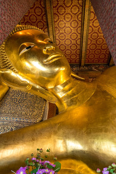 Wat Pho is a Buddhist temple complex in Thailand. The reclining Buddha is a main attraction in Bangkok