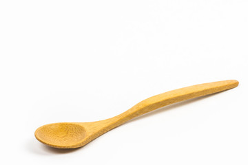 A small bamboo spoon isolated in white. 