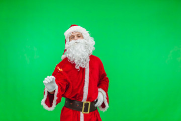 Santa holding sparkles, traditional new year bengal light. Happy new year celebrating concept. Chroma key