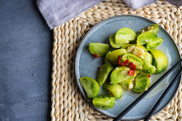 Spicy green tomato salad