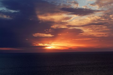 Naklejka na ściany i meble Sunset at the Mediterranean coast near Ajaccio in Corsica.