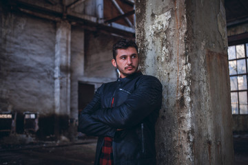 Biker in Empty old Grunge Hall