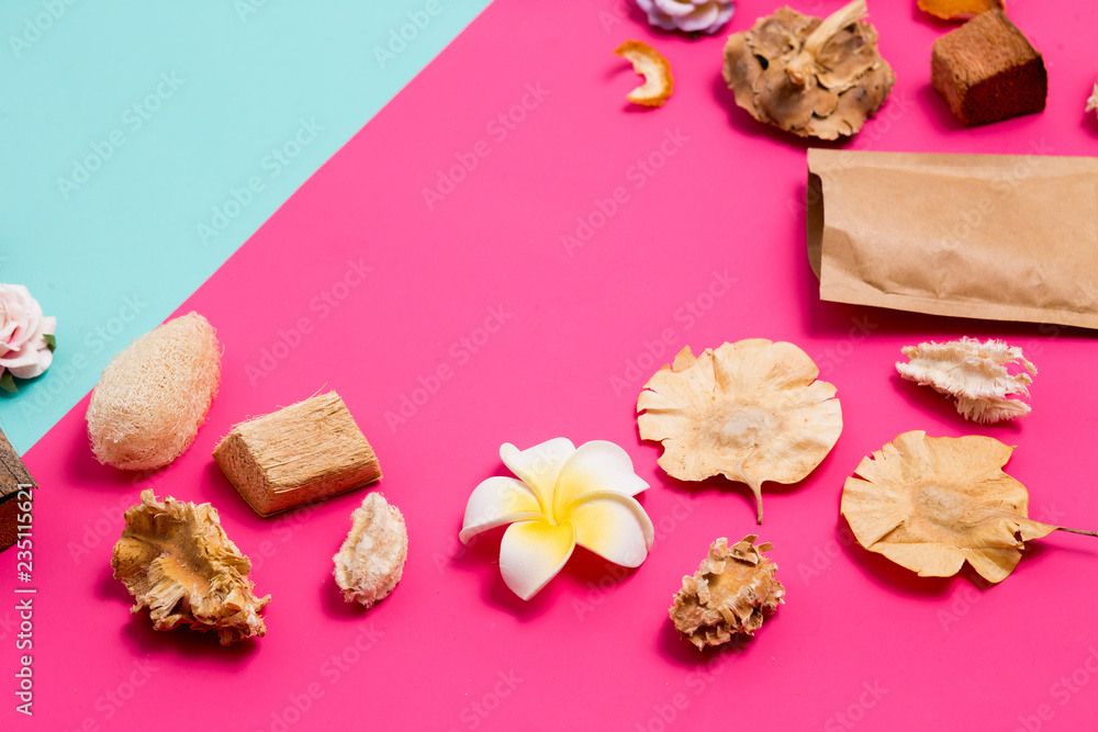 Poster closeup of beautiful spa items on a pink background with copy space for text