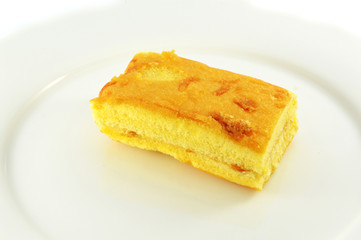 Cake egg dessert on plate on white background / bread egg isolated