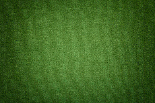 Dark green background from a textile material with wicker pattern, closeup.