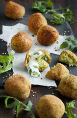 Fried vegetarian  falafel  with broccoli