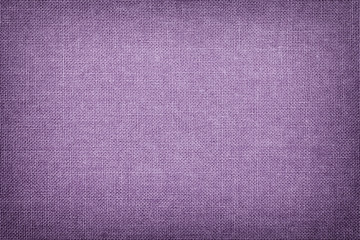 Light violet background from a textile material with wicker pattern, closeup.