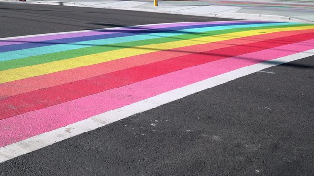 Rainbow crosswalk on city street
