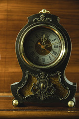 Antique vintage watches. Home Watch the beginning of the twentieth century. wooden background
