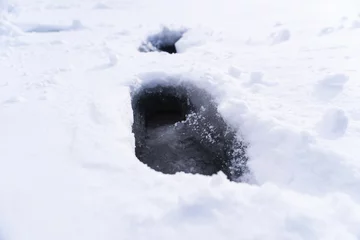 Fotobehang Footprint and hands on snow © auimeesri