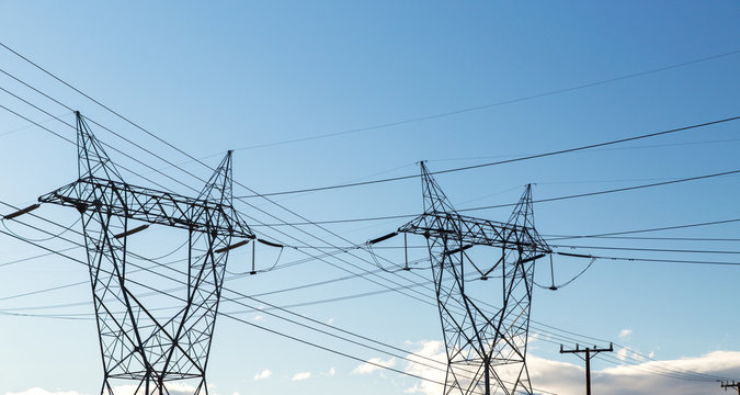 power line and electricity concept - transmission towers in united states of america