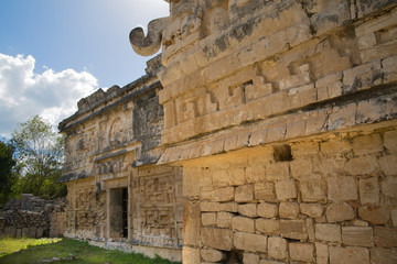 Mexico, Yucatán - February 15, 2018: Mexico, Chichen Itza. Detail of decorative band of temple. Ruins of the private yard, possibly belonged to the royal family